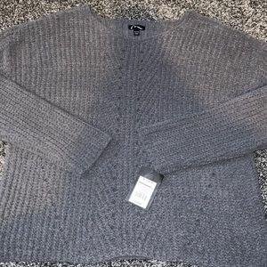 gray kids sweater with the tags